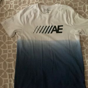 American Eagle blue + white gradient tee w/ black AE branding.